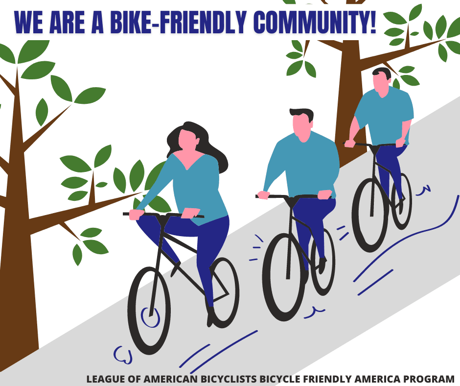 An image of people riding bikes with the phrase 