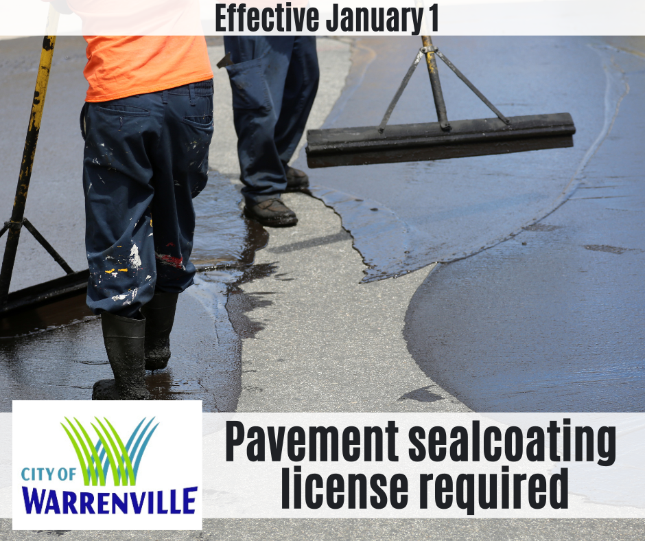 Photo of pavement sealcoating to announce coal tar ban.