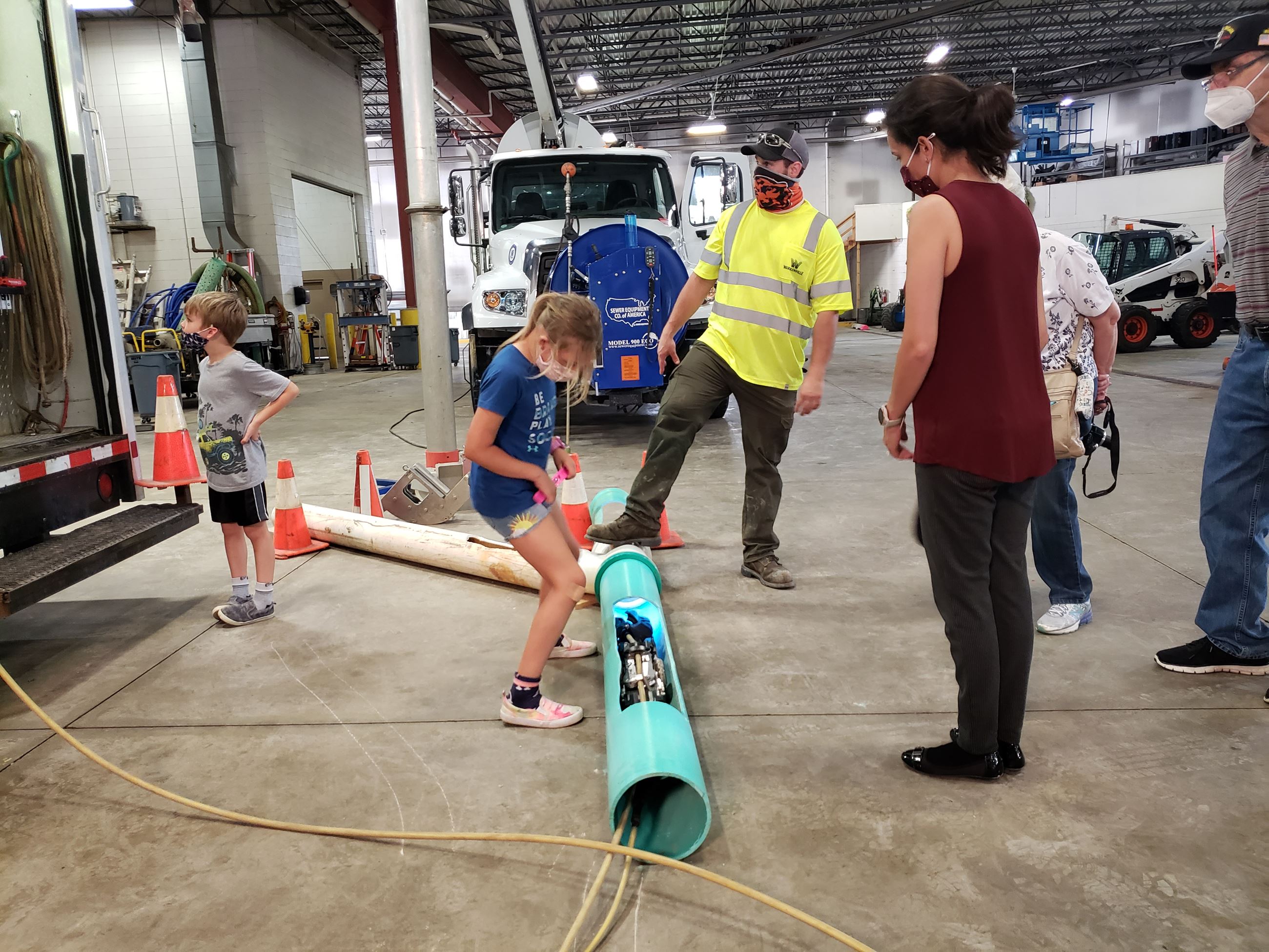 Public Works Open House attendees learn about the utility division
